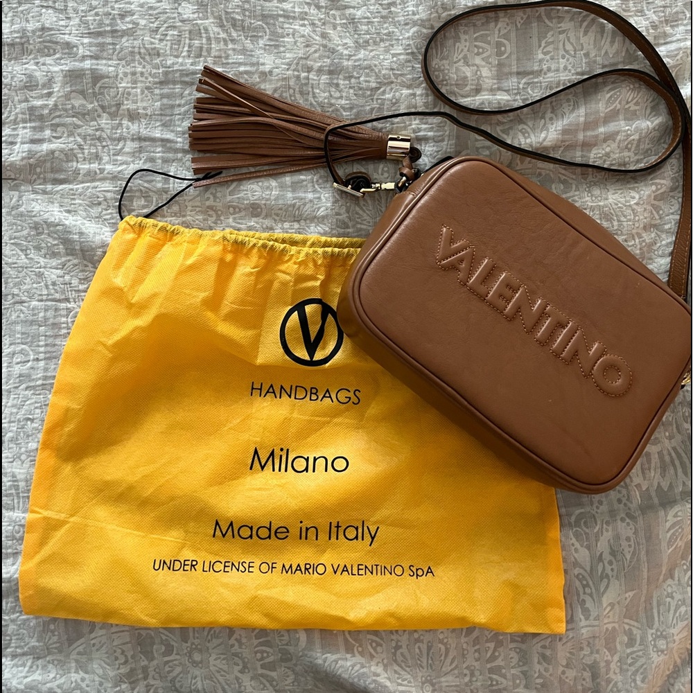 Mario Valentino Crossbody with extra gold chain extenders.
